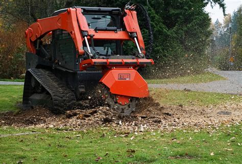 clearing trees with a skid steer|stump grinder skid steer.